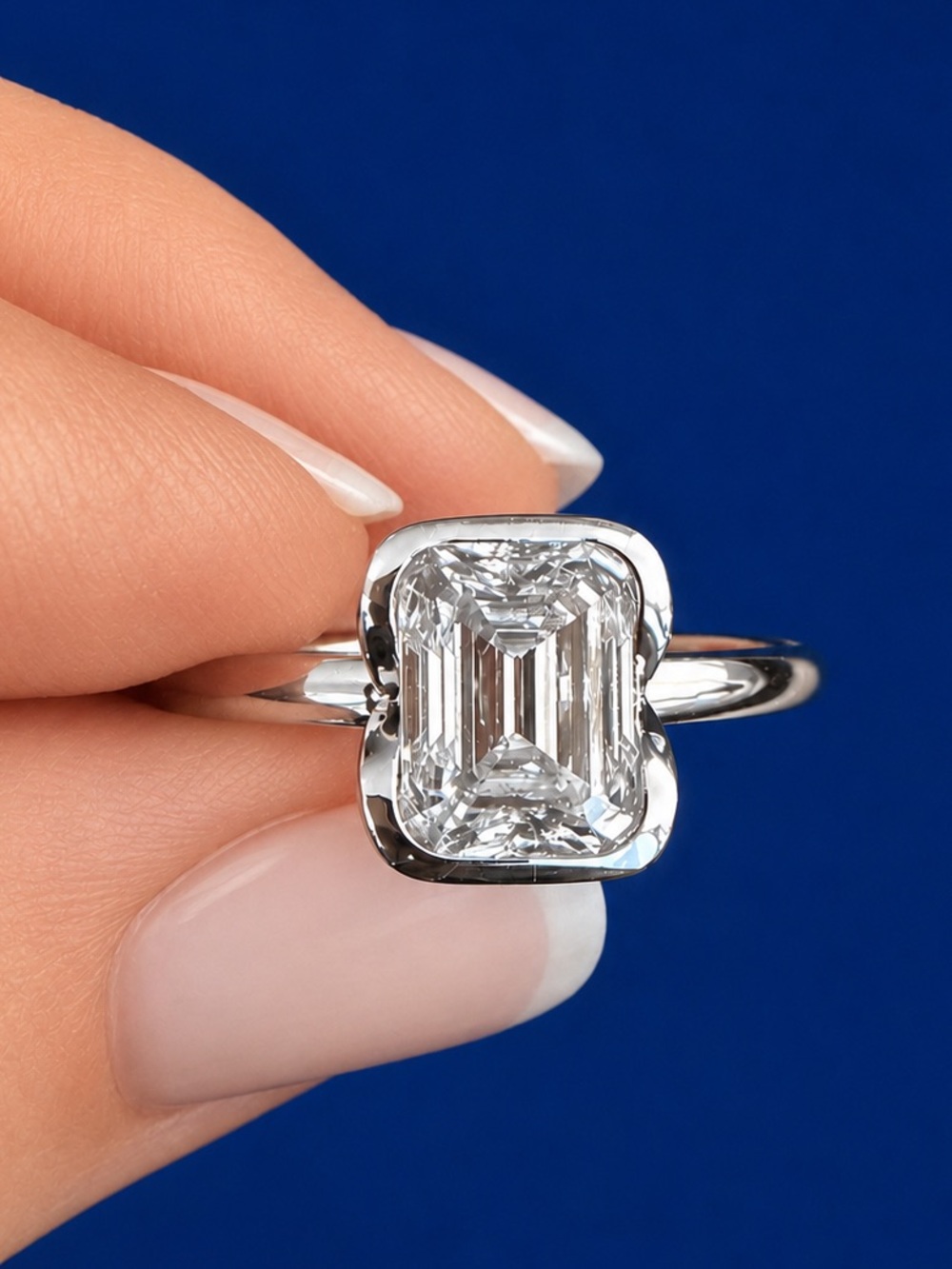 2 CT Emerald Cut Solitaire Moissanite, SZ 6, Set in Sterling Silver Custom Band.